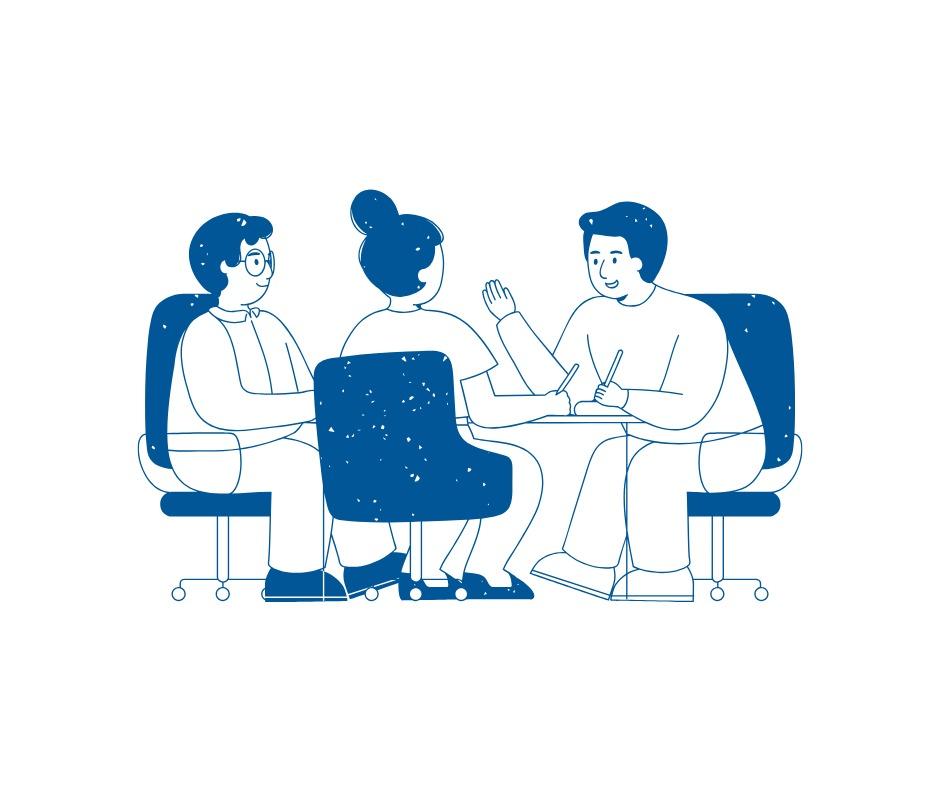 employees gathered around a meeting table